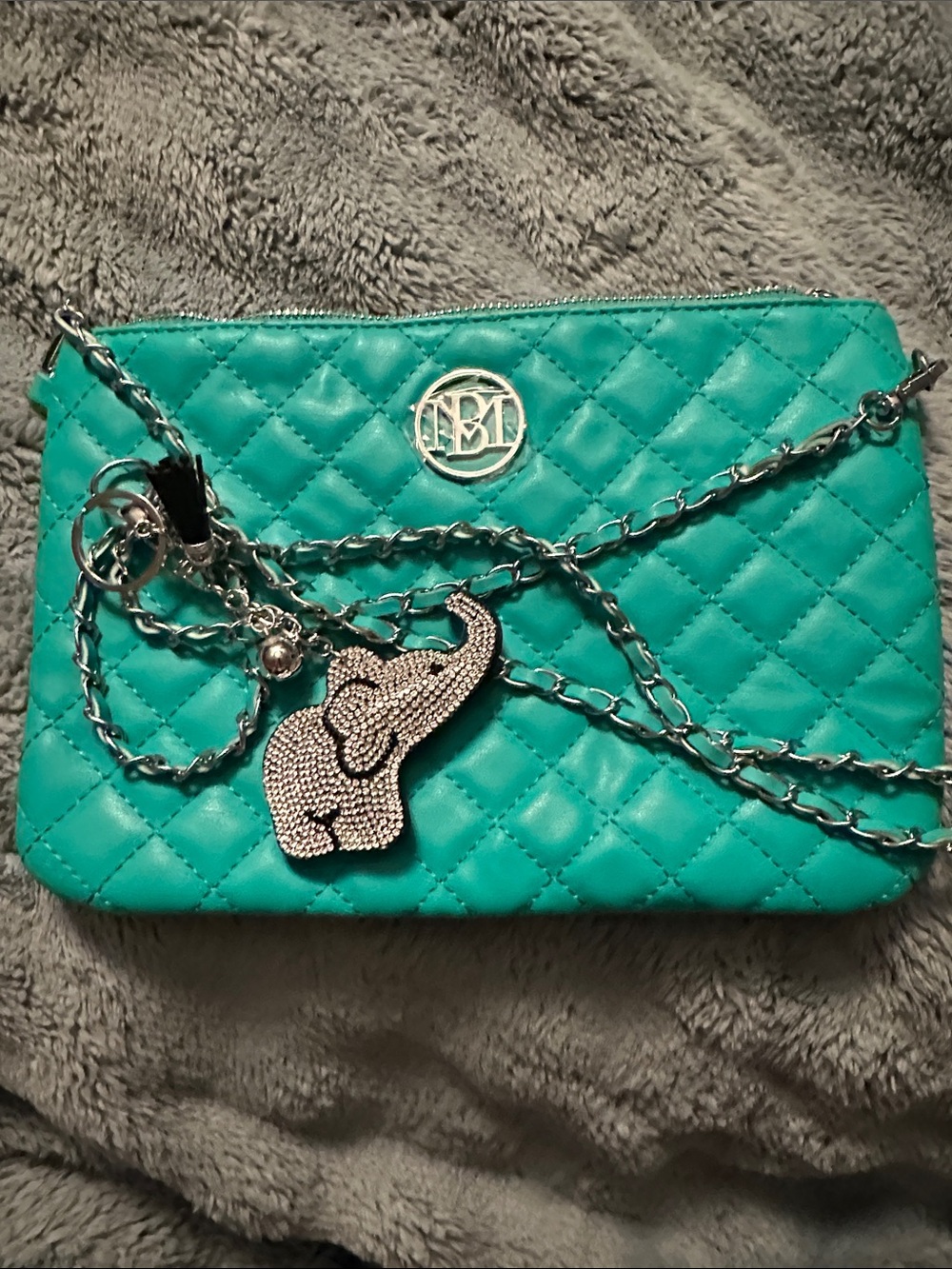 Badgley Mischka Teal Quilted Wristlet with Elephant Charm